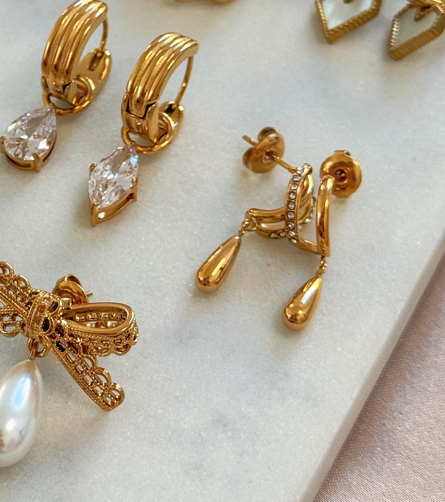 Crystal teardrop huggies