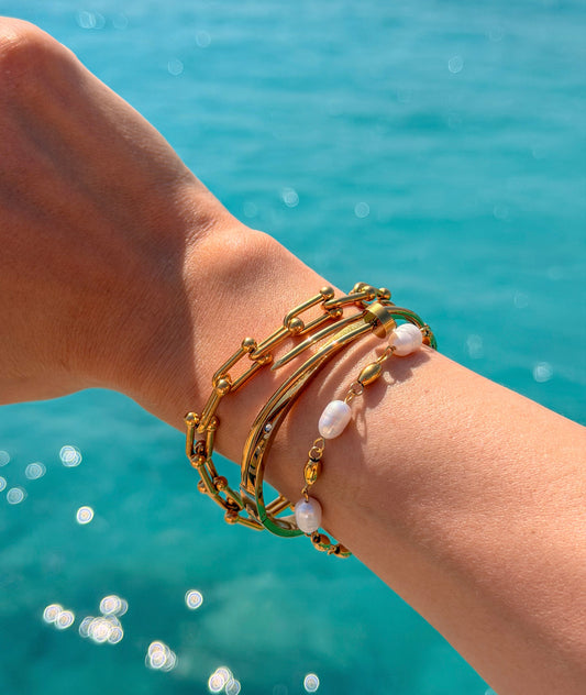 Gold nail statement bangle