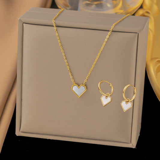 Love heart charm earrings