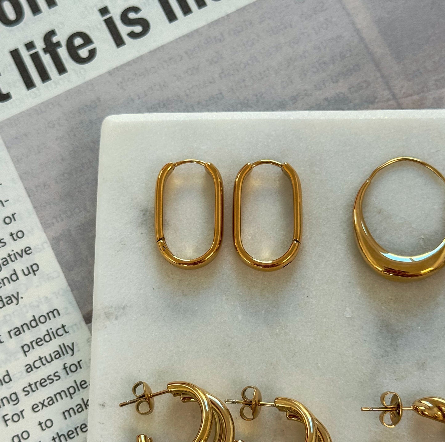 Modern gold oval hoops